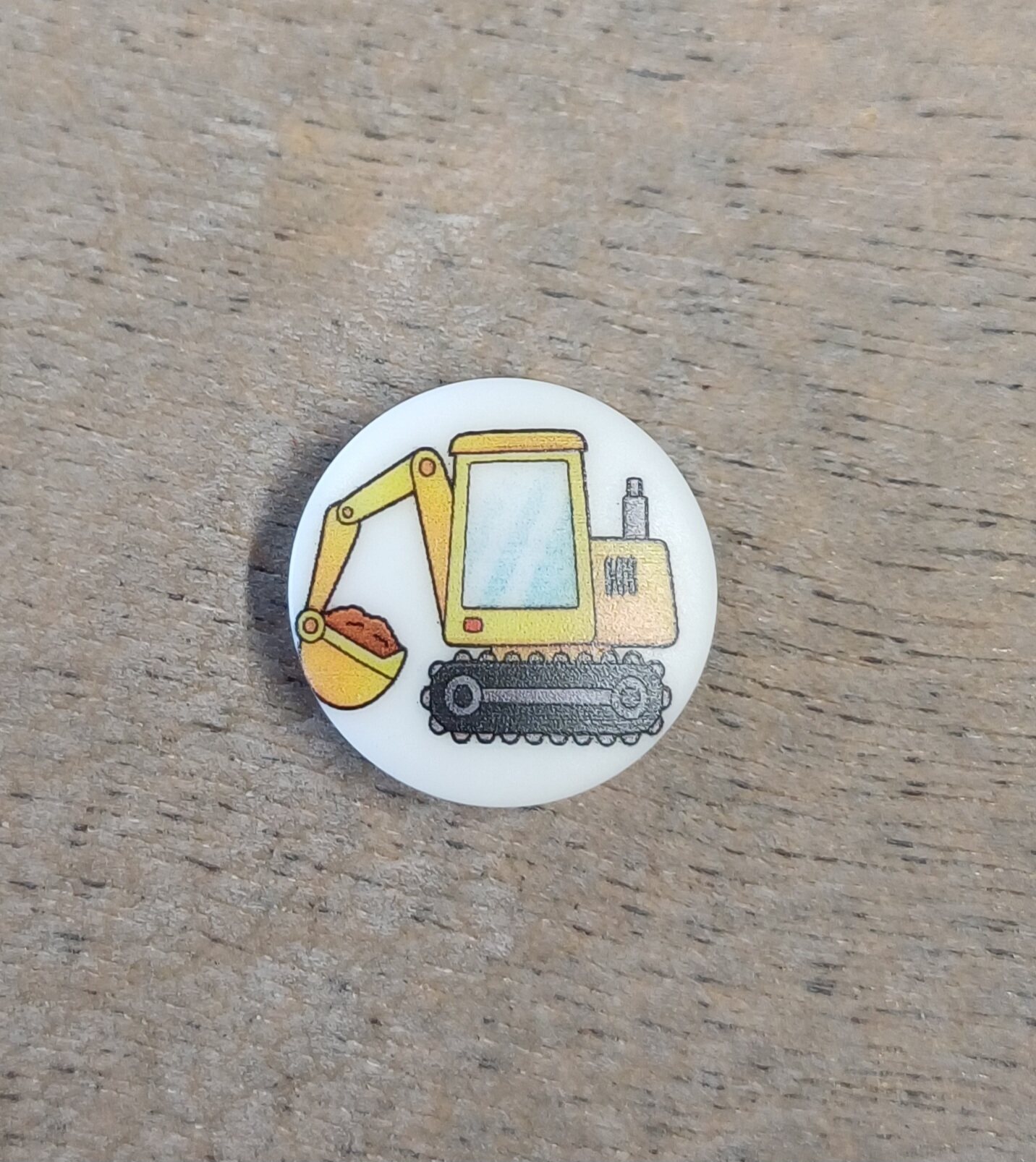 Falk Group Napit pienille auto- ja koneihmisille Kaivinkone