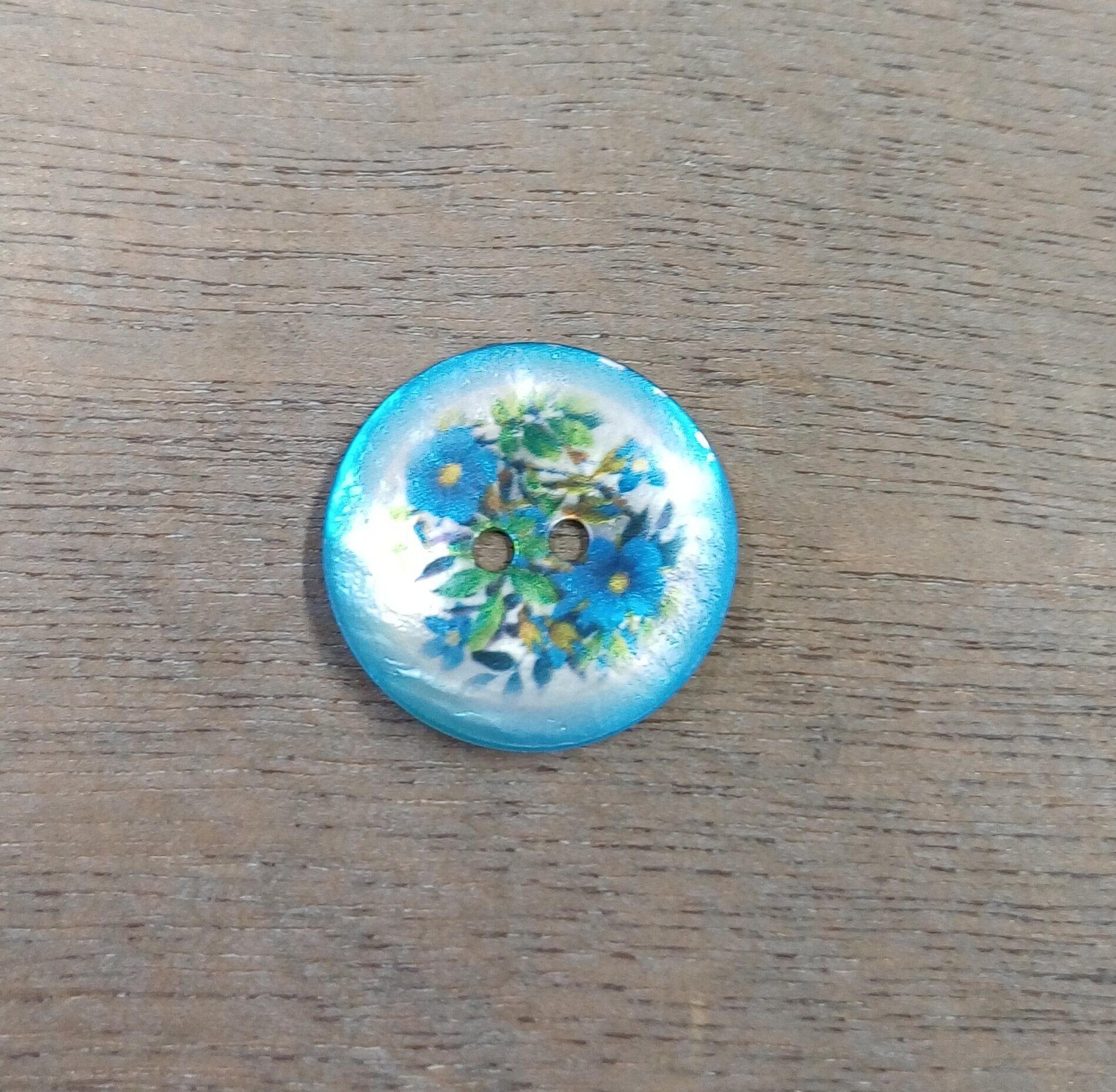 Helmiäisnapit kukkakuviolla Sininen